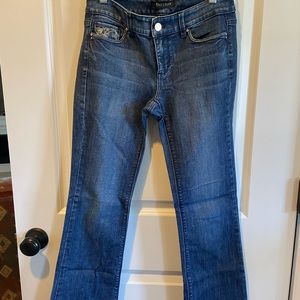 White House Black Market size 0S Blanc boot cut mid rise beaded jeans.